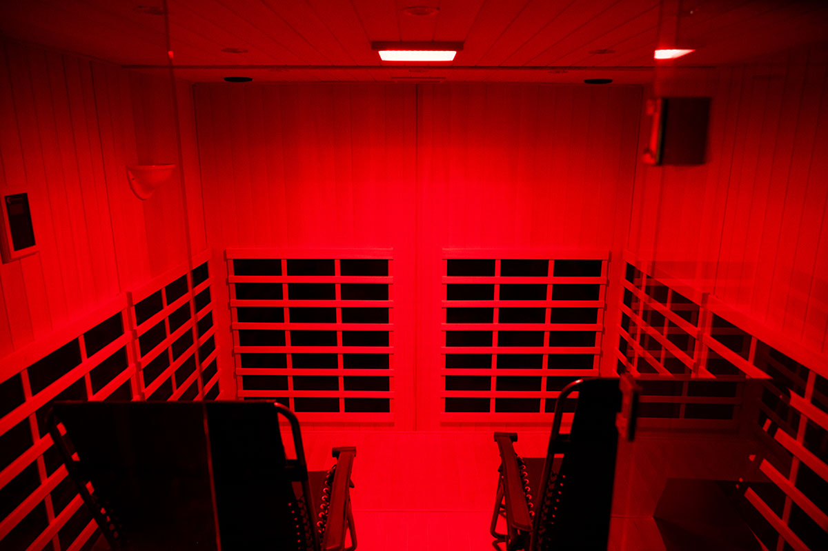 HaloSauna with red light therapy. Two zero gravity chairs inside.