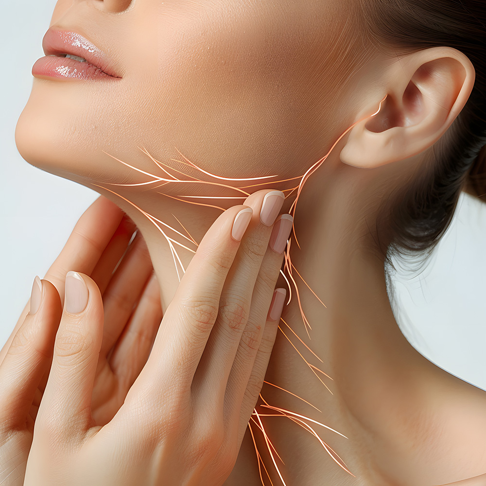 Lymphatic Massage: Woman touching face, with lymphatic vessels visible through the skin.